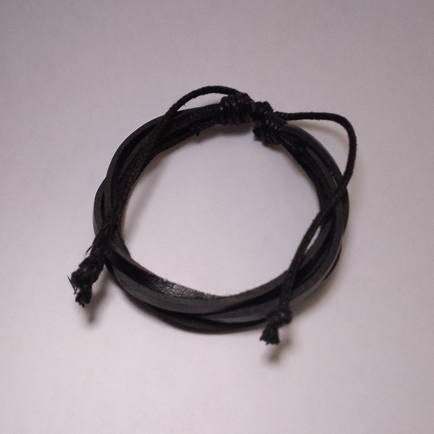Unisex black corded leather bracelet, trendy Kenyan artisan-crafted gift
