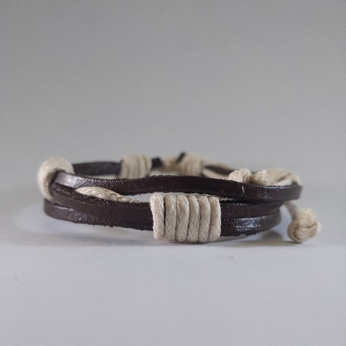 Handmade brown leather bracelet with white accent for sale in Kenya – stylish unisex accessory