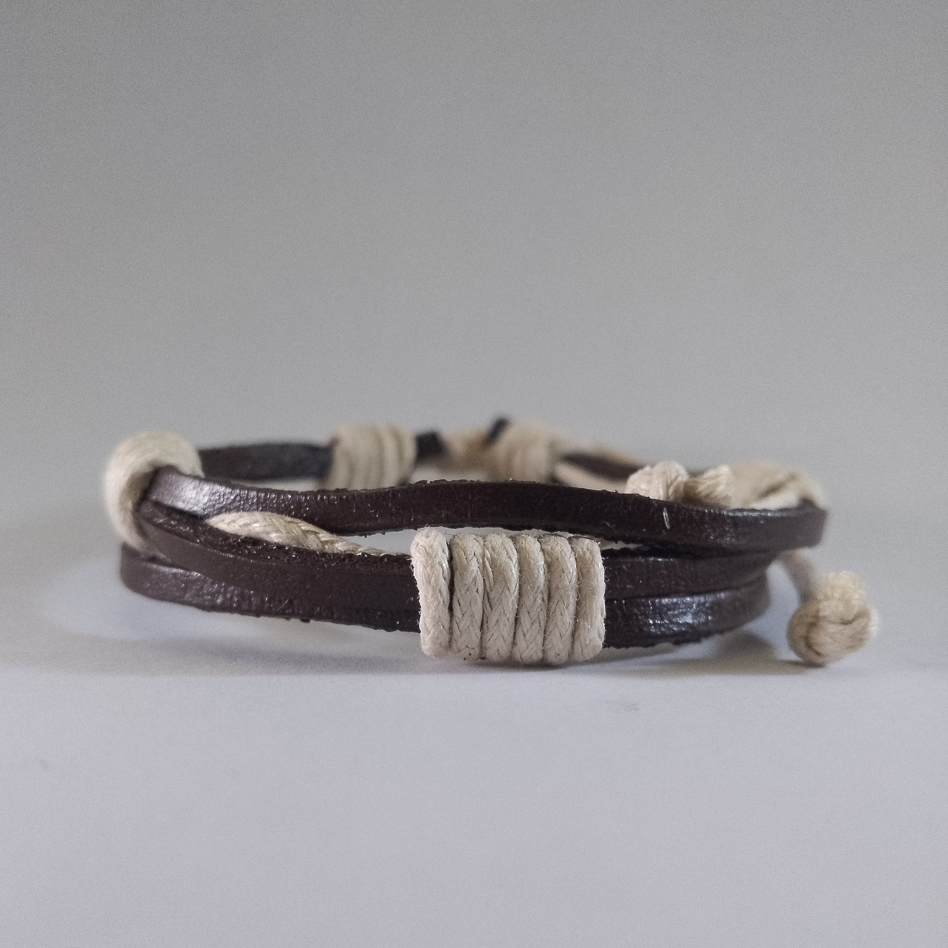 Handmade brown leather bracelet with white accent for sale in Kenya – stylish unisex accessory