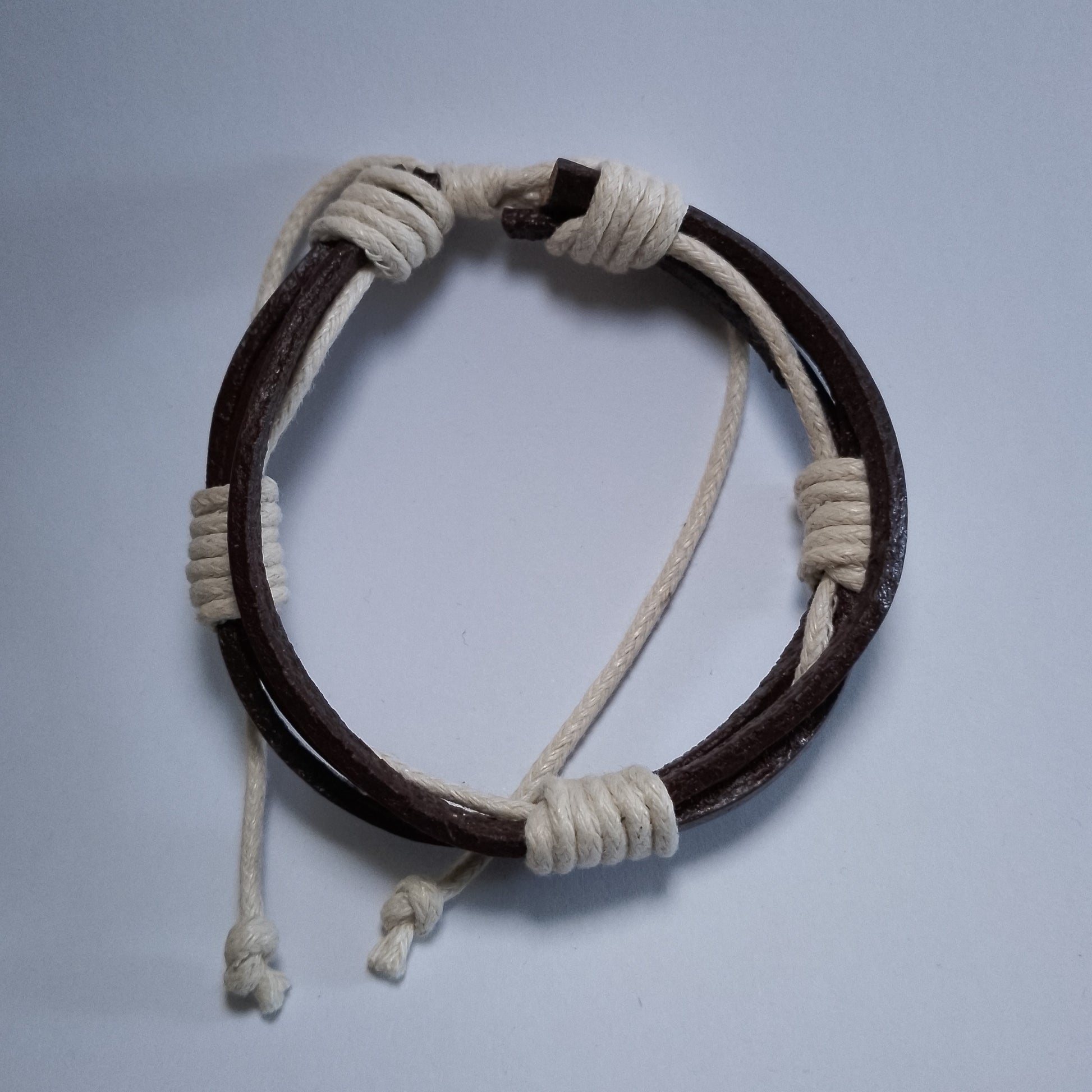 Premium brown leather bracelet with white detail – trendy Kenyan handmade jewelry for men & women