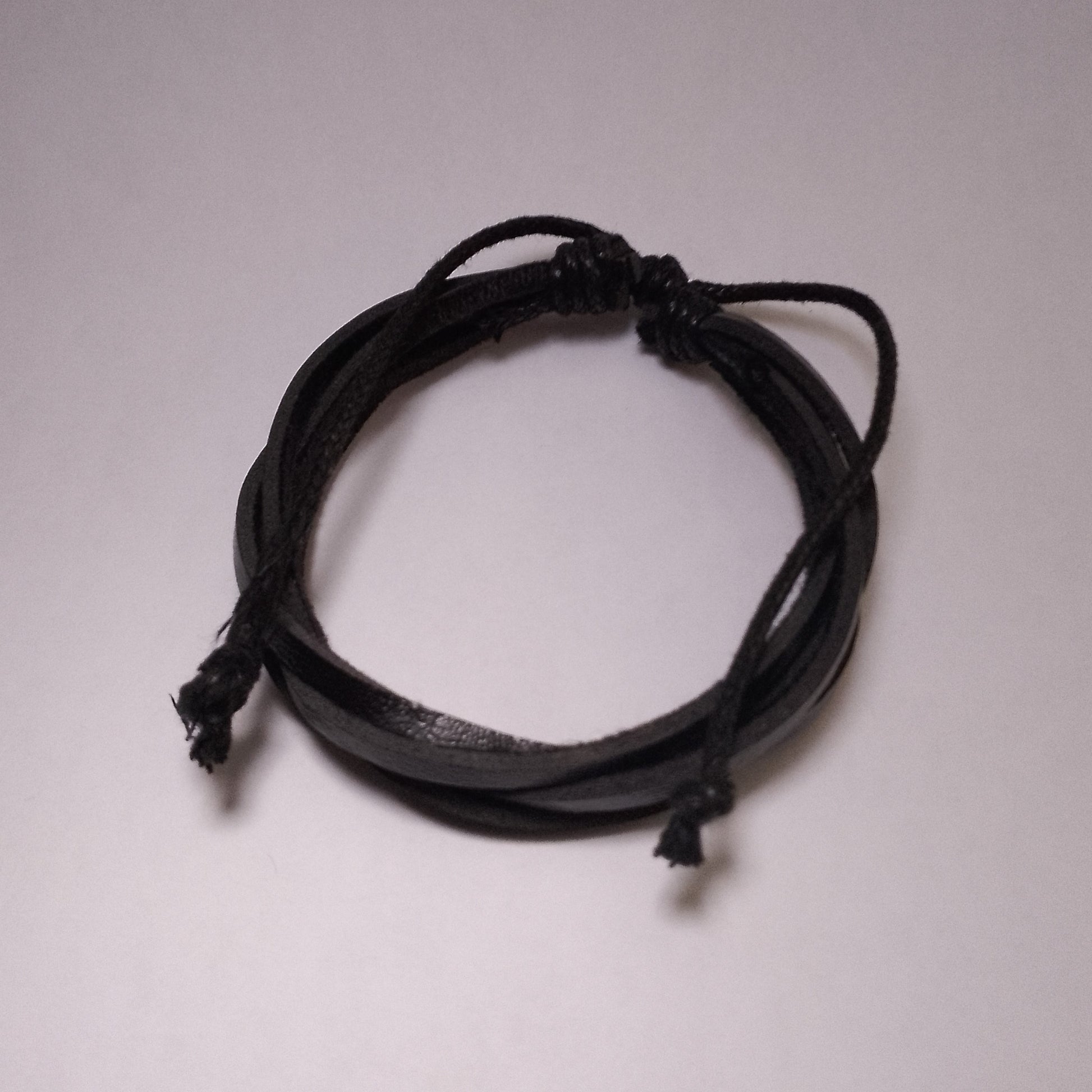 Unisex black corded leather bracelet, trendy Kenyan artisan-crafted gift