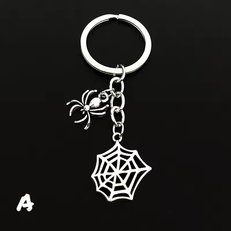 Spider silver metal key holder with web. Shop cool accessories like spiderman keychain sold by grown man shop kenya.